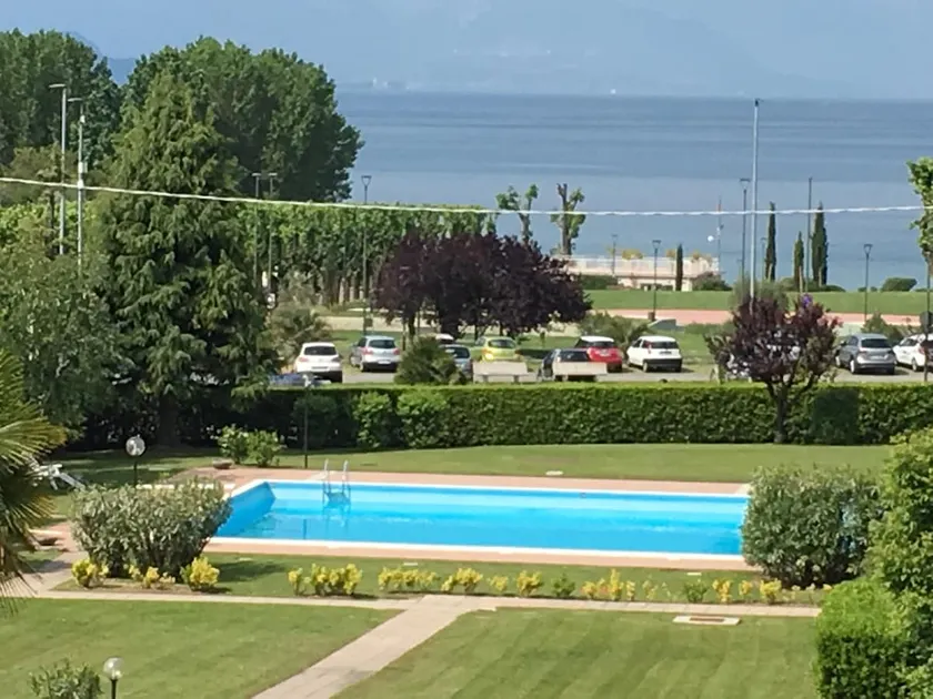Window overlooking the lake, Desenzano del Garda - Image 1