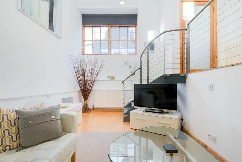 Unwind in the Mezzanine Dining Space at a West End Abode - Image 1