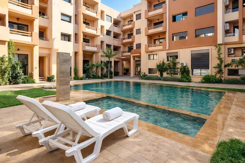 Chic boho 2BR•5 Pools•Balcony•Downtown & city view - Image 1
