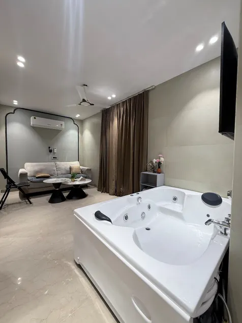 Ozira stakestaycation-1BHK with Terrace and Jacuzi - Image 1