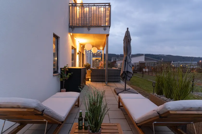 Welcoming Earthy Home · Patio Sunbed & Poker Table - Image 1