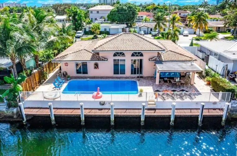 Easygoing Coastal Getaway Pool & Waterfront Patio - Image 1