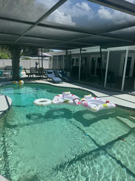 Sunny Escape with Pool & Hot Tub - Image 1