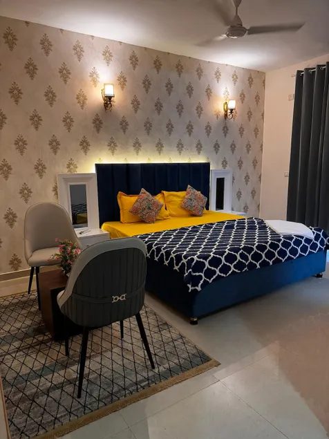Zoomstay - 3BHK Poolside Suite 2 - Image 1