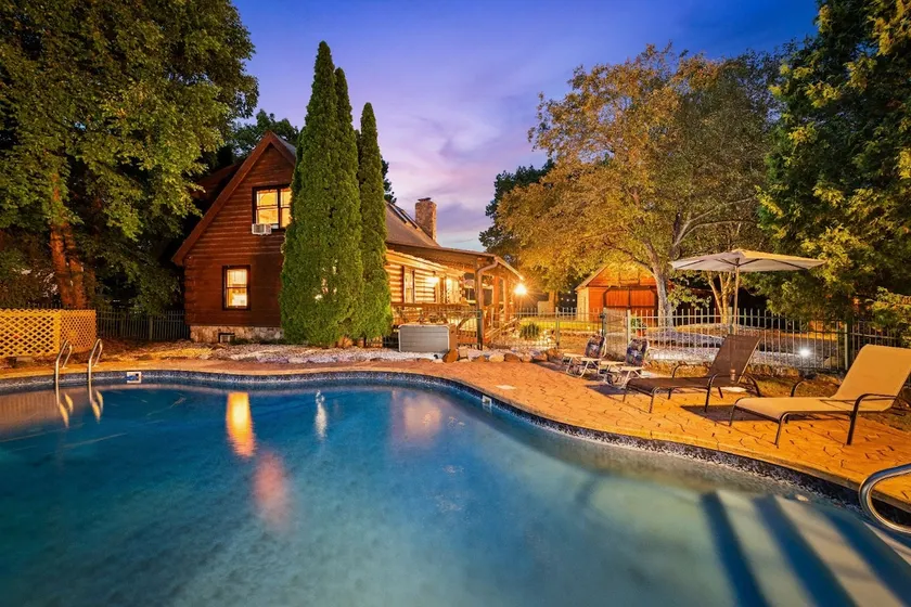 Riverfront Cabin • Heated Pool, Hot Tub & Sauna - Image 1