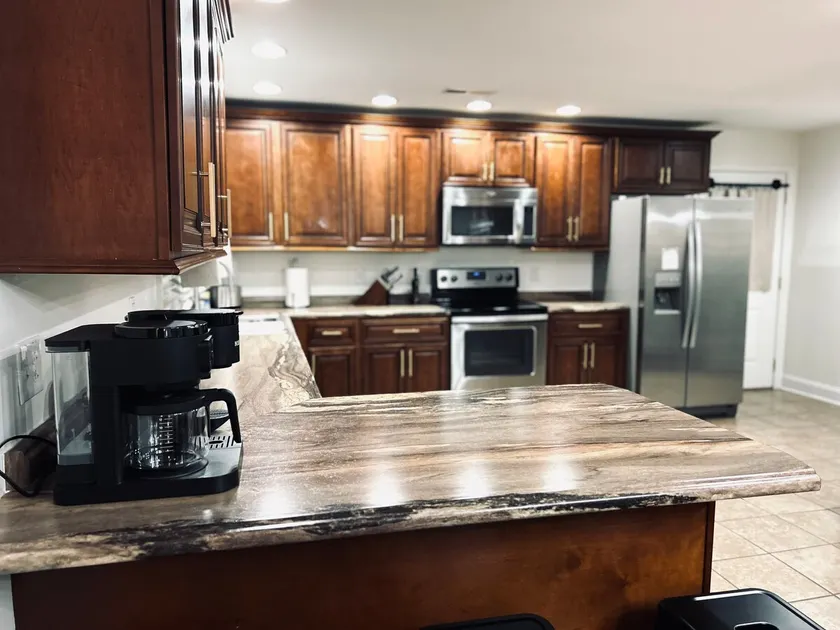 Modern Home with yard & Tesla Charger, Next to UC! - Image 1