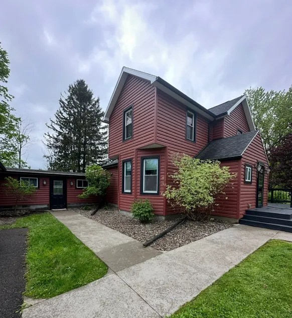 The Scarlet Roost • Airport & Finger Lakes Hub - Image 1