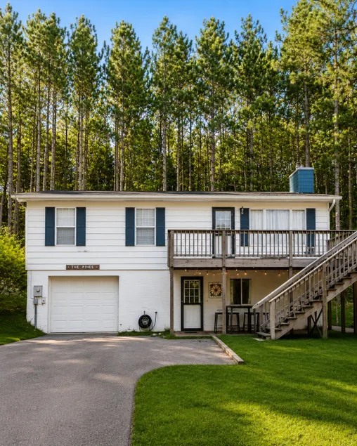 Cozy 3BR w/ Yard Games ~Walk to Downtown + Lake MI - Image 1