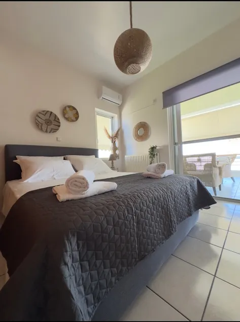 Anemoessa | Seaside Retreat with Balcony & View - Image 1
