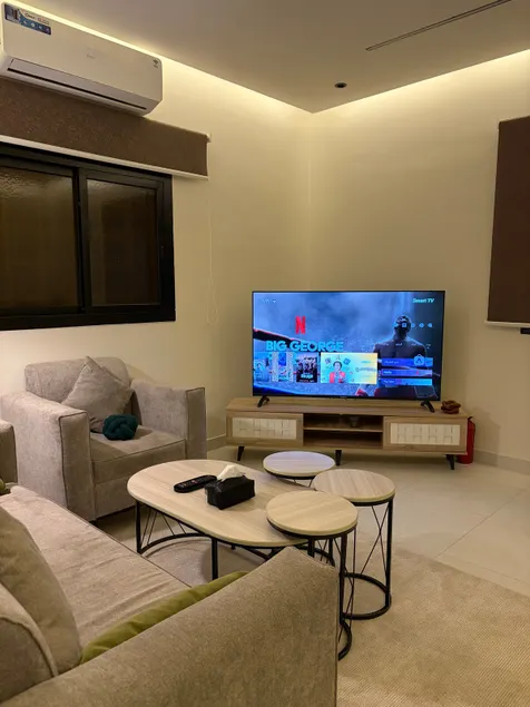 Room and lounge in Al Murooj B, self check-in and coffee corner - Image 1