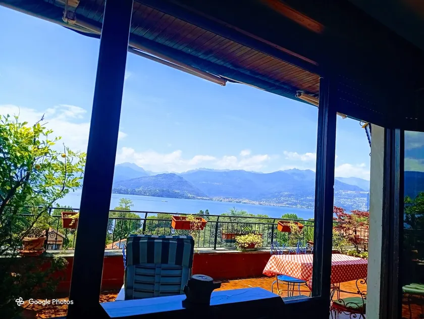The penthouse with a terrace overlooking the lake, mountains, and stars - Image 1