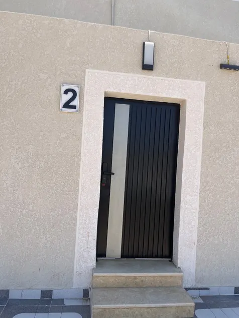 Room, separate entrance hall, and self check-in in Al Naqra neighborhood - Image 1