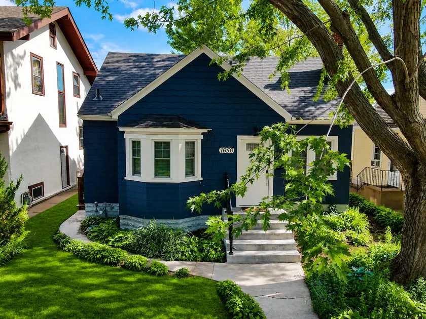 Cozy 4BR Home. Walk to Allianz. Near Both Cities - Image 1