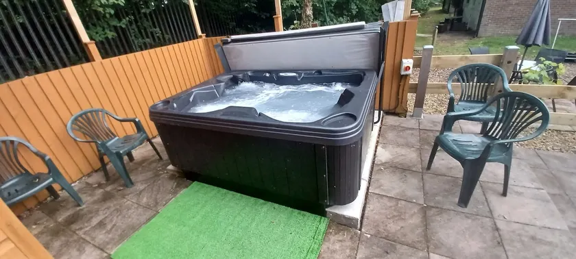 124 Snowdon Drive with a hot tub & football table. - Image 1