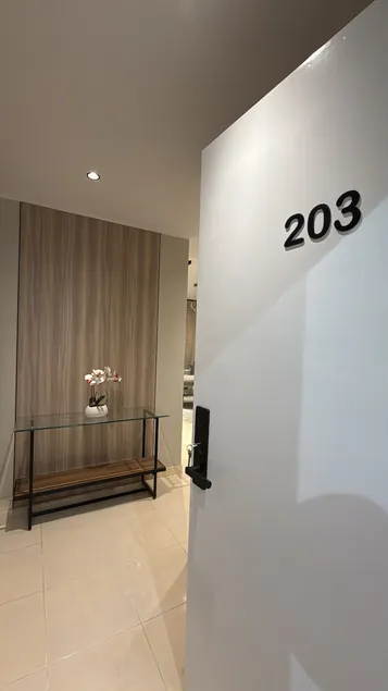 A hall, two bedrooms, and a kitchen 203 - Image 1