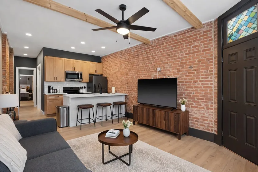 Exposed Brick • Bar Next Door • Laundry• Free WiFi - Image 1