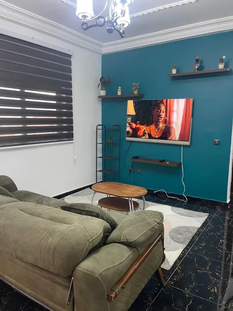 Chic Furnished 1 Bedroom Apartment Yaounde Living Room - Image 1