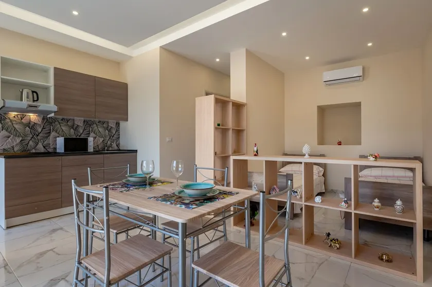 GuestHost - Isole Ciclopi View - Lovely Apartment - Image 1