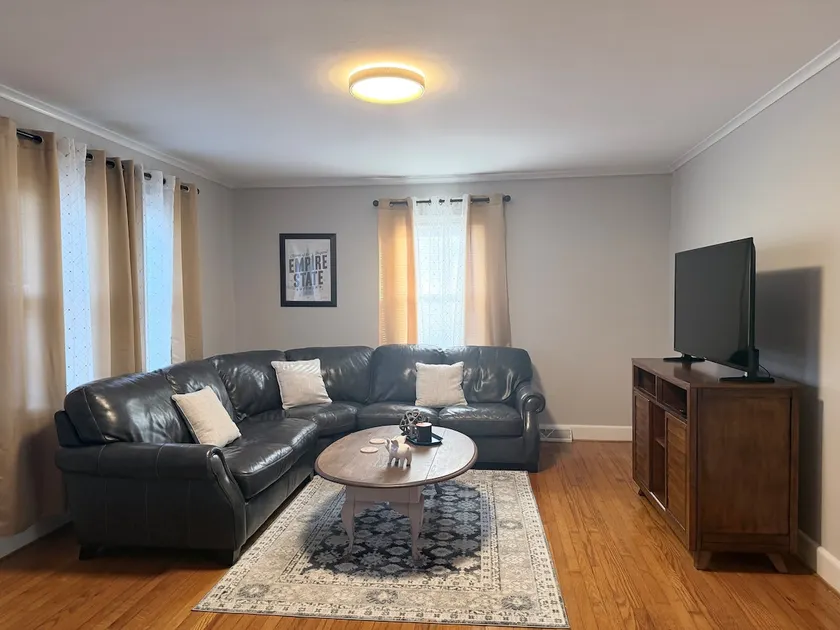 Cozy Stay Near DT with Deck and Yard - Image 1
