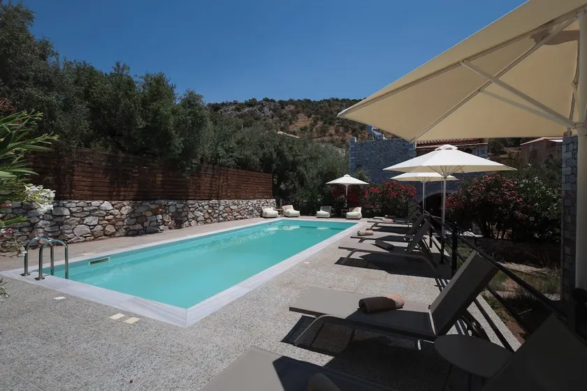 CasaDiMani Rosa Stone Villa with Shared Pool - Image 1