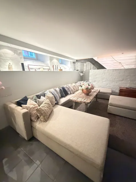 Spacious 3BR Apartment | Family Lounge with TV - Image 1