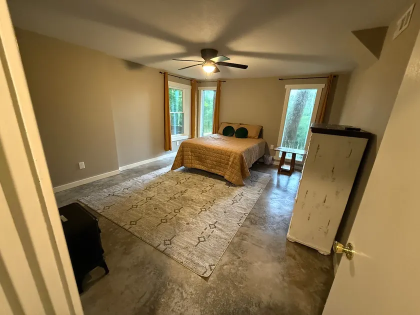 Bright Private Guest Unit Wooded View • Bike Shop - Image 1