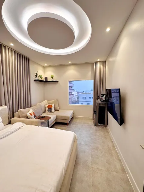 A studio with a beautiful view of the city - Image 1