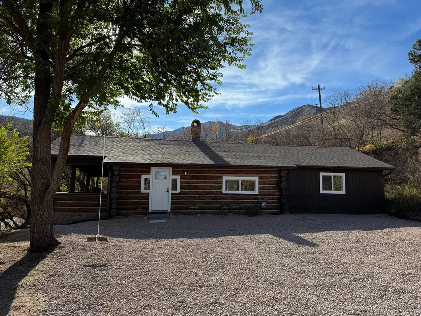 Cozy Creekside Cabin - Image 1