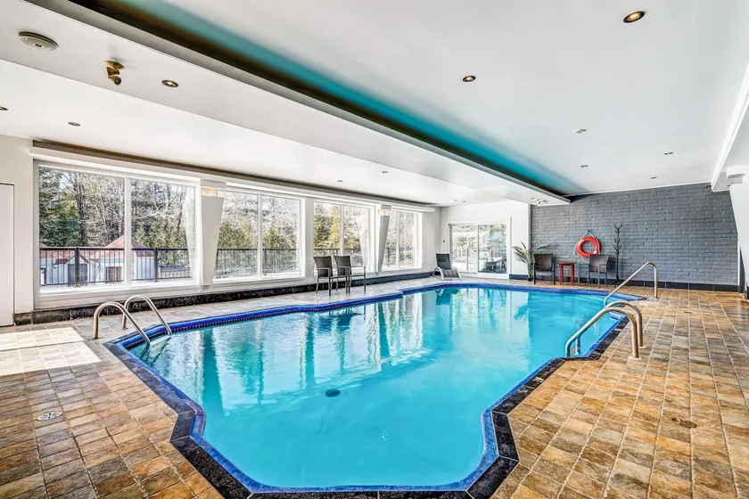 325 - Condo | Spa | Sauna | Piscine | Gym | Ski - Image 1