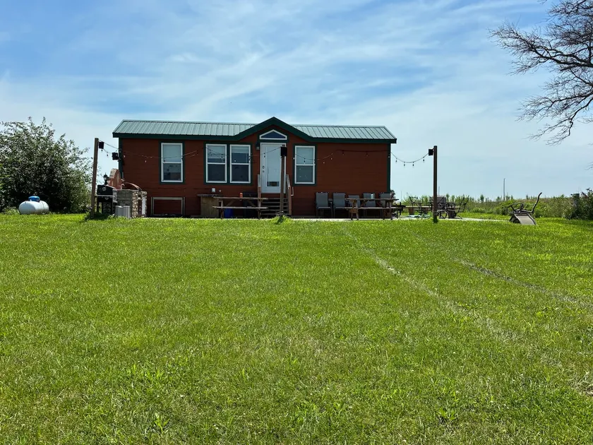 Entire 50 acre lake and cabin - Image 1