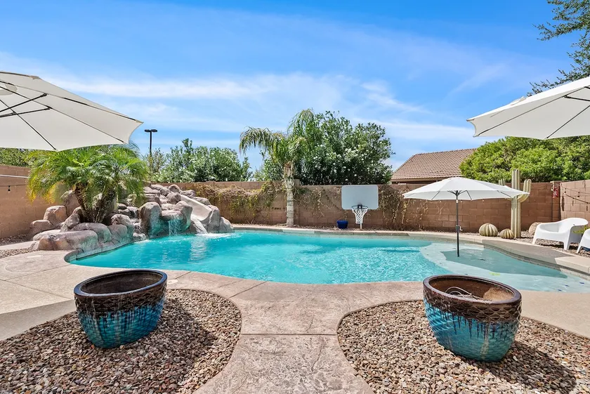 Tiki D's Oasis | Pool with slide • Tiki Bar • Hot tub - Image 1