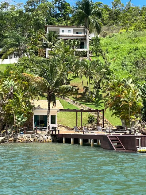 House in Angra With a pier in the sea and a floating jet p - Image 1