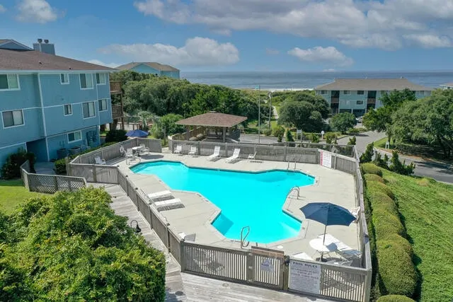 Steps to Caswell Beach|Pools, Sunsets & Golf Views - Image 1