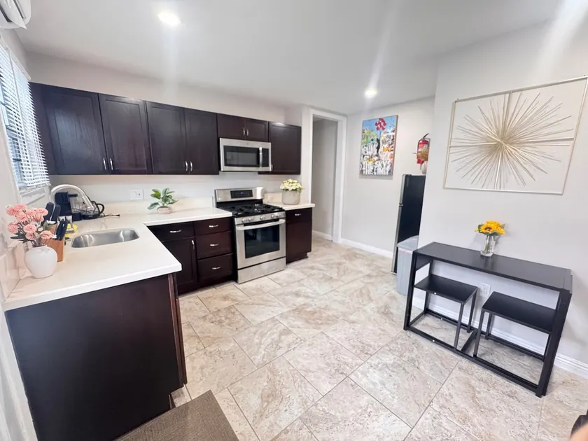 650 sq ft one living room with private yard C23 - Image 1