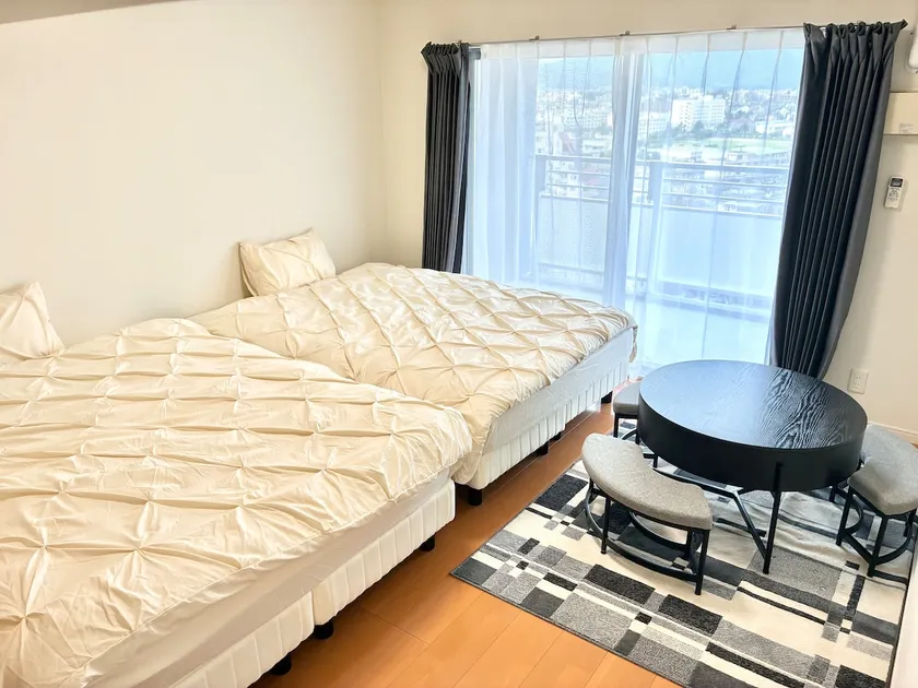 Great view from the top floor! Convenience stores and supermarkets are close by! 10 minutes to LaLaport Fukuoka! Private hotel in Hakata Ward - Image 1