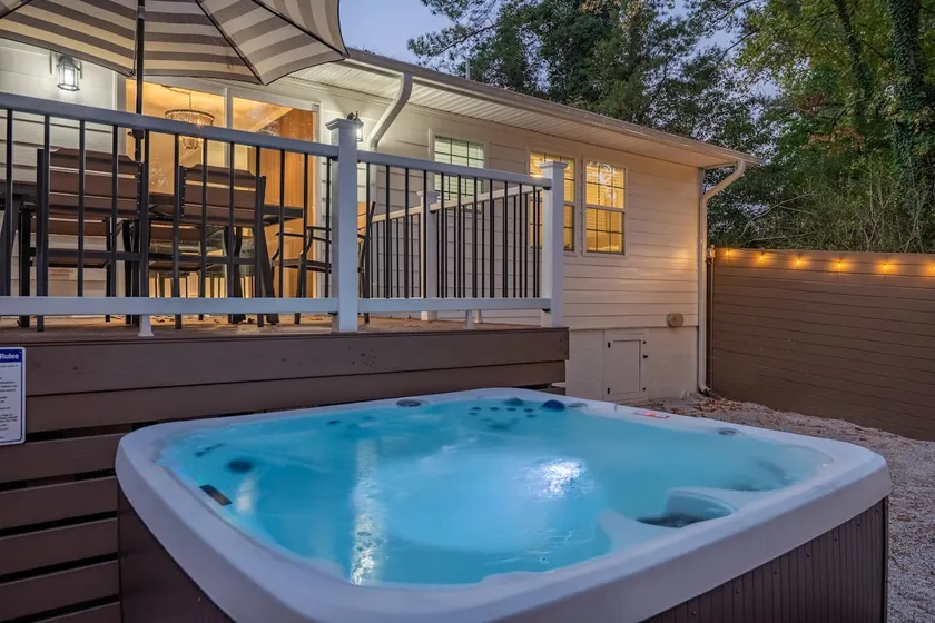 Cary Hot Tub, Outdoor Movies, Fire Pit & Games - Image 1