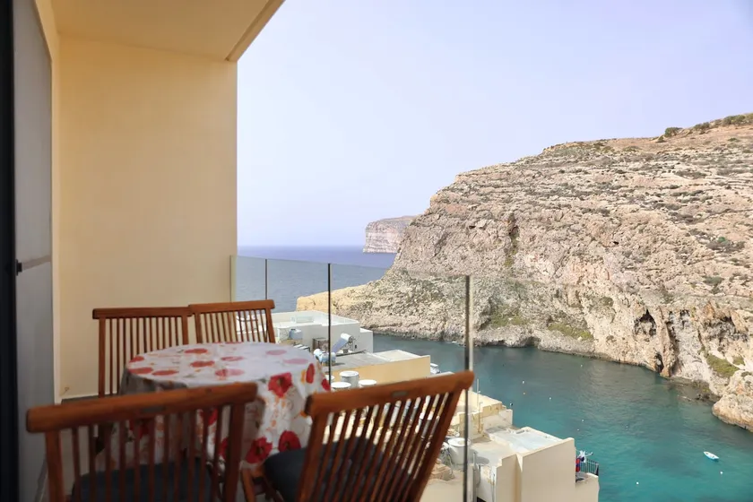 Gozo Xlendi Coastal Apartment with Stunning Sea View, Free Private Parking, AC & WiFi - Image 1