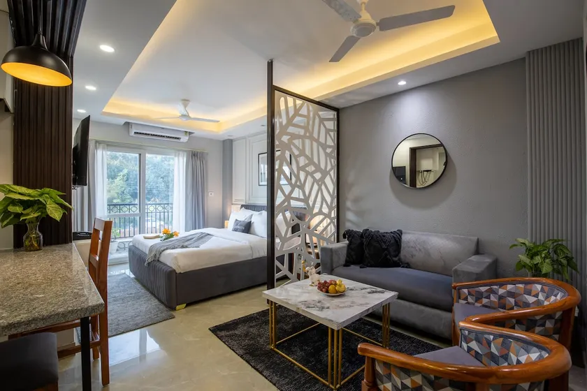 Elegant Chic 1BHK Suite w/ Balcony | Central GGM - Image 1