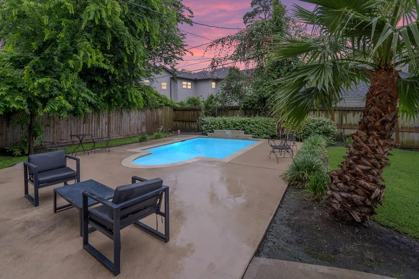 Stylish Duplex Retreat | Pool + Free Parking! - Image 1