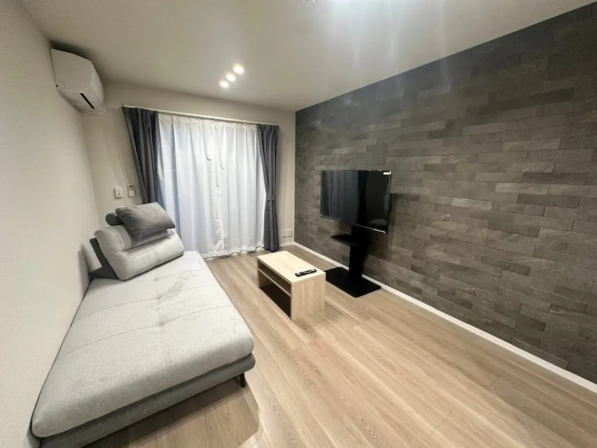 Wisteria's apartment, 4-minute walk from Misato Station, free parking, with a double bed and sofa bed. - Image 1
