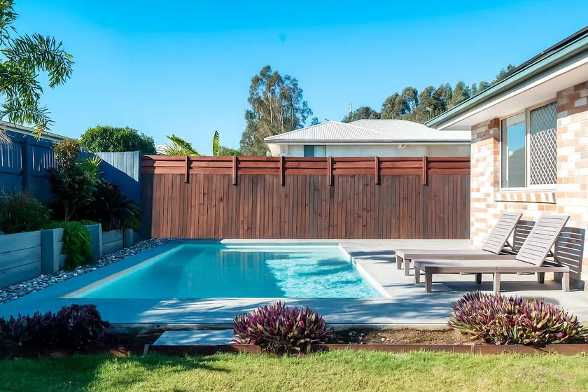 Theme Park Retreat - Sunlit Stillness by the Pool - Image 1