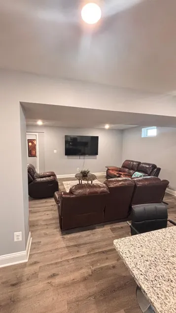 Homey 2-BR Basement Suite with Full Kitchen Access - Image 1