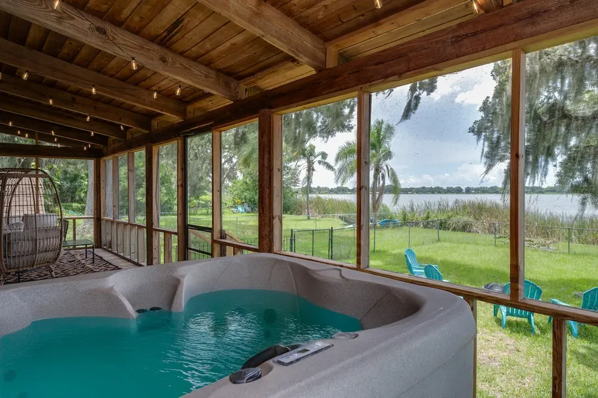 Lakeside Haven with Jacuzzi and Games - Image 1