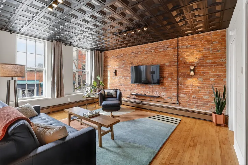 Brick Loft | Historic Downtown Walk-Up + Parking - Image 1