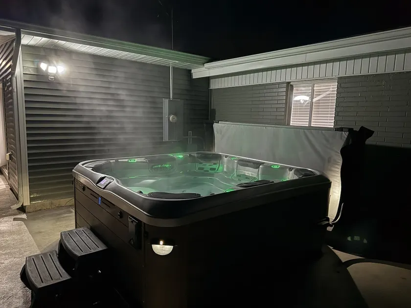 Cozy Remodeled 4BR Home | Hot Tub Oasis | 85” TV - Image 1