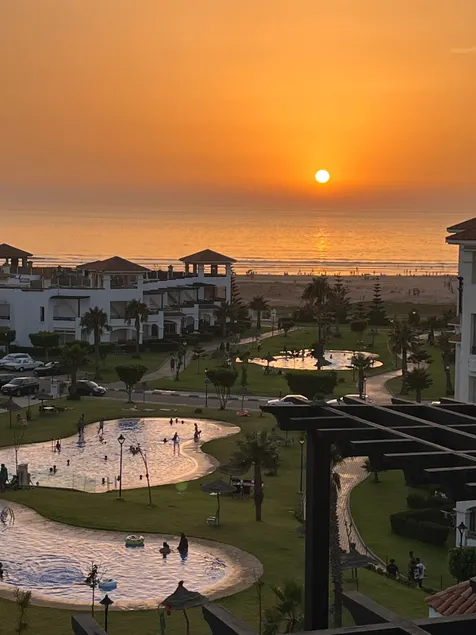 Beachfront Apartment in Assilah, Private Solarium, 4 Pools, Secure Residence, WiFi, Parking - Image 1