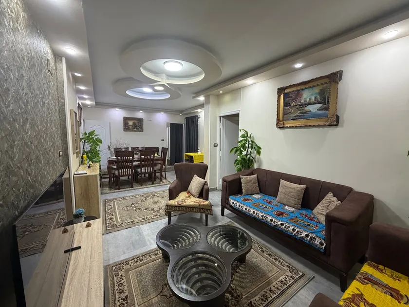 Elegant 4BR Family Apartment in Dokki Nile & Metro - Image 1