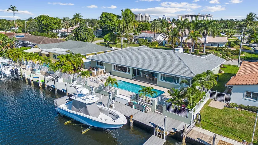 Waterfront Lux 4BR! Heated Pool + Outdoor Kitchen - Image 1