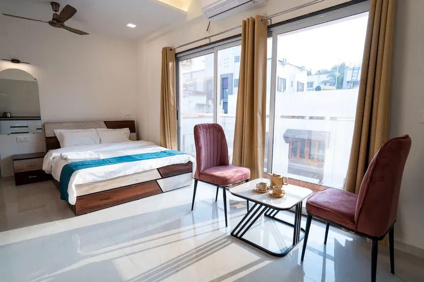 Premium Super Deluxe Room with Kitchen & Balcony - Image 1