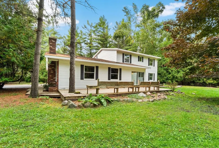 Sleeps up to 11 • Game Room • Fire Pit • Boat Slip - Image 1